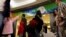 Passengers line up during a security check ahead of the 2016 Rio Olympics at Congonhas Airport in Sao Paulo, Brazil, July 18, 2016.