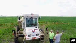 Agricultores en una granja de Illinois, en la región central de Estados Unidos.