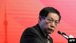 FILE - Ren Zhiqiang, the former chairman of state-owned property developer Huayuan Group, speaks at the China Public Welfare Forum in Beijing, Nov. 18, 2013.