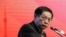 FILE - Ren Zhiqiang, the former chairman of state-owned property developer Huayuan Group, speaks at the China Public Welfare Forum in Beijing, Nov. 18, 2013.