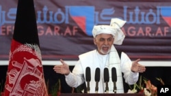 FILE - Afghanistan's President Ashraf Ghani speaks to religious leaders during an anti-corruption conference in Kabul, Afghanistan, Sept. 1, 2015. Ghani will host an international peace conference Tuesday .