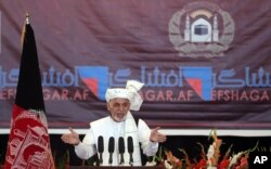 FILE - Afghanistan's President Ashraf Ghani speaks to religious leaders during an anti-corruption conference in Kabul, Afghanistan, Sept. 1, 2015.
