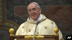 In this image made from video provided by CTV, Pope Francis celebrates his inaugural Mass with cardinals inside the Sistine Chapel at the Vatican, March 14, 2013.