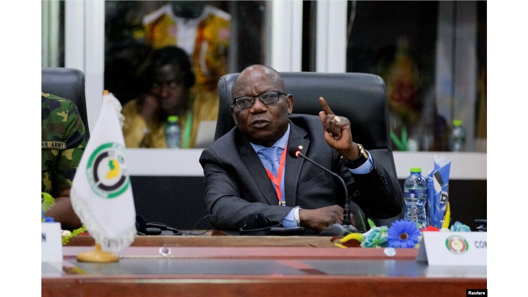 FILE - Abdel-Fatau Musah, ECOWAS commissioner, briefs the press on plans to deploy its standby force to the Republic of Niger, in Accra, Ghana, August 18, 2023.