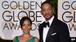 Jada Pinkett Smith, left, and Will Smith arrive at the 73rd annual Golden Globe Awards, Jan. 10, 2016.