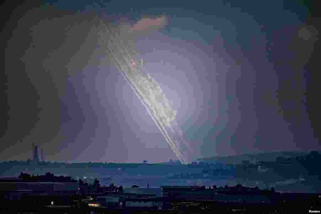 Rockets are launched from Lebanon towards Israel amid cross-border hostilities between Hezbollah and Israel as seen from northern Israel.