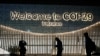 People walk outside the venue for the COP29 U.N. Climate Summit, in Baku, Azerbaijan, Nov. 11, 2024. 