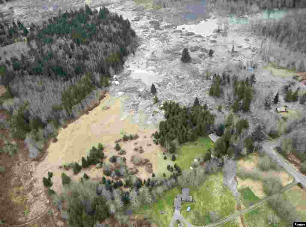 A general view of the area affected by a landslide near State Route 530 is seen in this Washington State Department of Transportation handout picture taken near Oso, Washington, March 22, 2014.