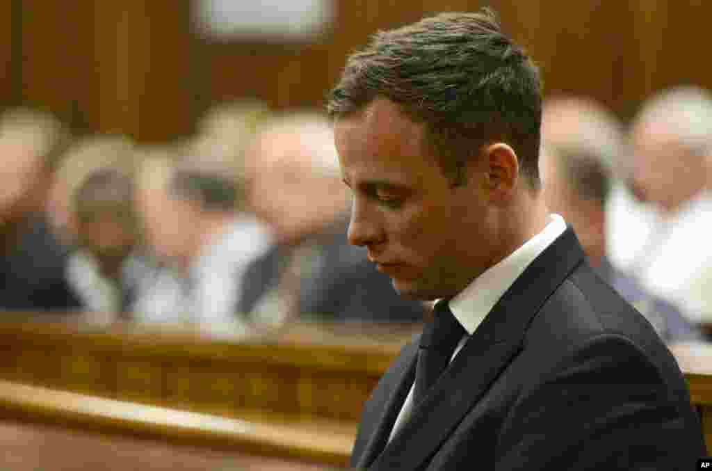 Oscar Pistorius sits in court, after judge Thokozile Masipa&nbsp;sentenced him to five years in prison, in Pretoria, South Africa, Oct. 21, 2014. 