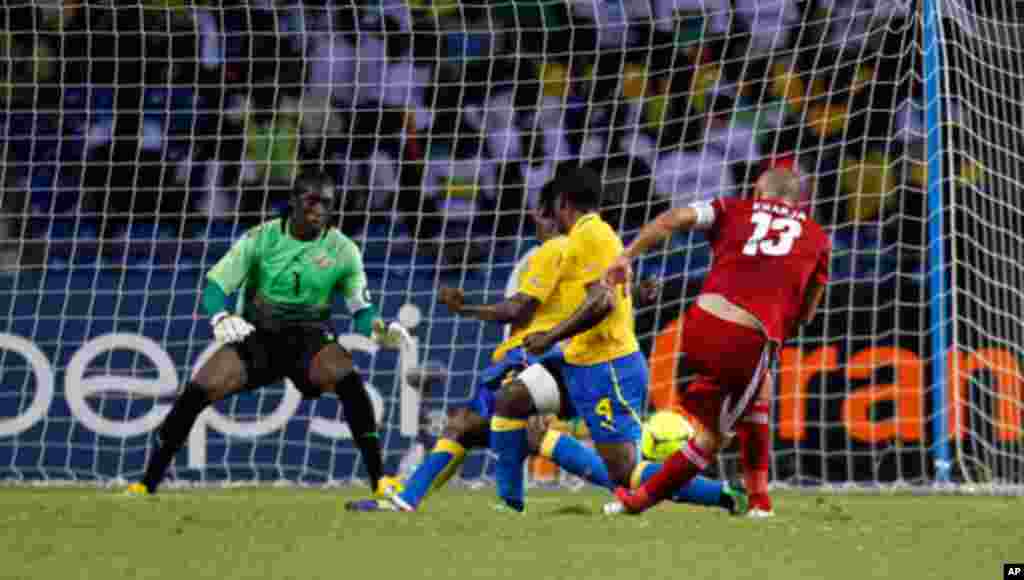 Morocco's Kharja scores his goal against Gabon during their African Cup of Nations soccer match in Libreville
