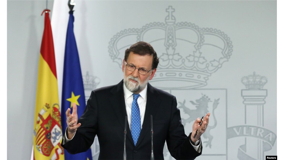 FILE - Spain's Prime Minister Mariano Rajoy attends a press conference at the Moncloa Palace in Madrid, Dec. 22, 2017.