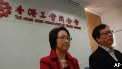 工聯會政務委員會正副主任鄭耀棠(右)與陳婉嫻宣佈，工聯會60席選委全數支持梁振英