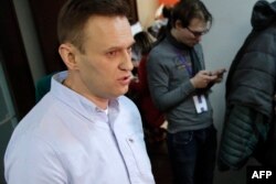 FILE - Russian opposition leader Alexei Navalny is seen at his office in Moscow, March 18, 2018.