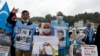 Members of Uyghur community living in Turkey stage a protest outside the Chinese consulate in Istanbul, June 2, 2021. They protest agains alleged oppression by the Chinese government to Muslim Uyghurs in far-western Xinjiang province.