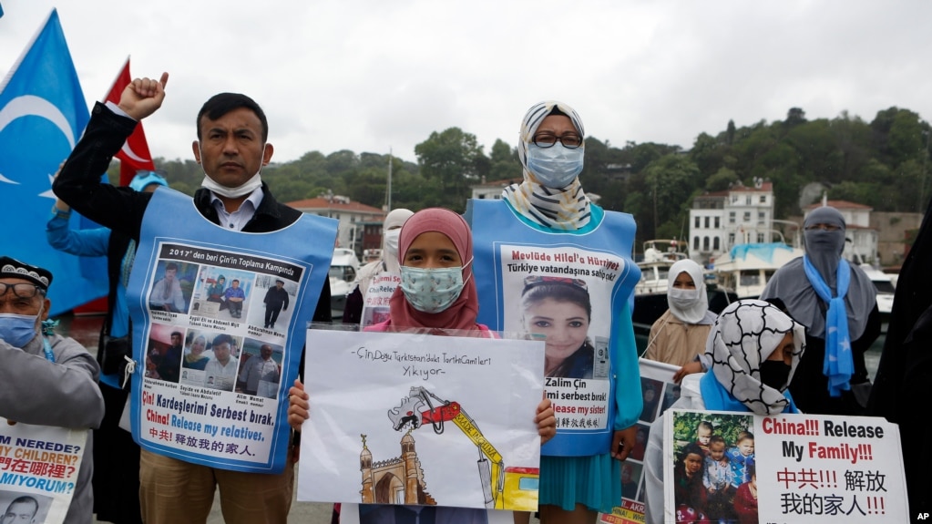 Members of Uyghur community living in Turkey stage a protest outside the Chinese consulate in Istanbul, June 2, 2021. They protest agains alleged oppression by the Chinese government to Muslim Uyghurs in far-western Xinjiang province.