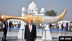 U.N. Secretary General Antonio Guterres stands before the Sikh Gurdwara Darbar Sahib, in Kartarpur, Pakistan, Feb. 18, 2020. (Courtesy @antonioguterres) 