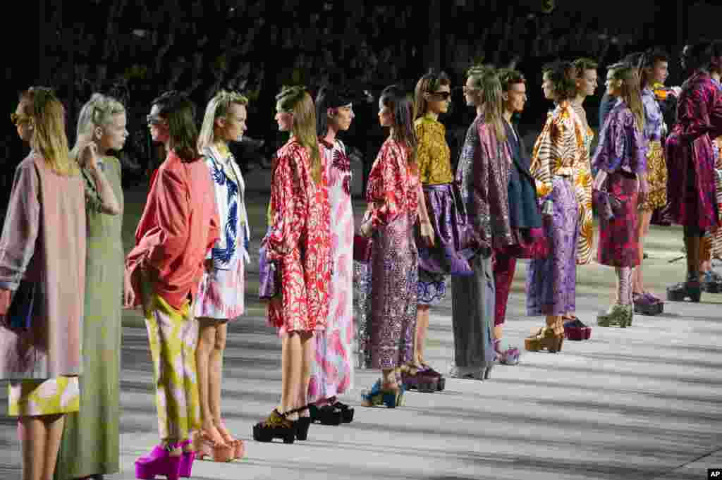 Models wear creations of Dries Van Notens as part of his Spring-Summer 2016 ready-to-wear fashion collection, presented during the Paris Fashion Week in Paris, France.