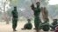 FILE - Fighters of the former Mozambican rebel movement "Renamo" receiving military training, Nov. 8, 2012