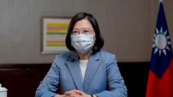 In this photo released by the Taiwan Presidential Office, Taiwan's President Tsai Ing-wen speaks at the presidential office in Taipei, Taiwan, Sunday, June 20, 2021. (Taiwan Presidential Office via AP)