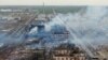 An aerial view shows smoke rising following an explosion at a chemical plant in Yancheng in China's eastern Jiangsu province early on March 22, 2019.