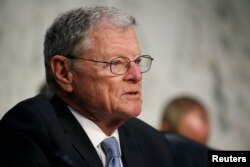 FILE - Senator James Inhofe (R-OK), Chairman of the Senate Armed Services Committee, attends a hearing on Worldwide Threats on Capitol Hill in Washington, March 6, 2018.