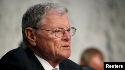 FILE - Sen. James Inhofe, R-Okla., participates in a hearing on Capitol Hill in Washington, March 6, 2018. 