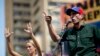 Pendukung dan Penentang Presiden Venezuela Berpawai di Caracas