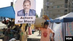 ຄຸ້ມ Morsi ໃນກຸງໄຄໂຣ