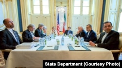 Secretary Kerry, Iranian Foreign Minister Zarif and respective teams sit together amid Iranian nuclear program negotiations in Vienna, Austria, July 2, 2015. (Photo: State Department)