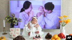 Lee Dong Kil's daughter Lee Yoon Seol celebrates her the 100th day of the birth in Daejeon, South Korea, April 9, 2019. Just two hours after Lee’s daughter was born on New Year’s Eve, the clock struck midnight, 2019 was ushered in, and the infant became 2-years-old.