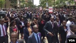 Kenyan lawyers march through streets of Nairobi to protest the alleged extrajudicial killing by police of their colleague, Willie Kimani, his client and their taxi driver, July 6, 2016. (J. Craig/VOA)