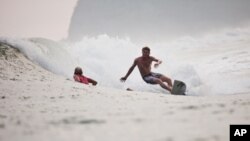 When members of Surf for Life weren't riding the waves in El Cuco, El Salvador, they worked on a school improvement project.