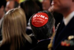A participant wears a Trump "Make America Great Again" yarmulke at a White House Hanukkah reception in Washington, Dec. 11, 2019.