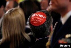 A participant wears a Trump "Make America Great Again" yarmulke at a White House Hanukkah reception in Washington, Dec. 11, 2019.