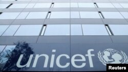 FILE - A UNICEF logo is pictured outside the organization's offices in Geneva, Switzerland, Jan. 30, 2017.