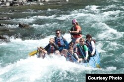 National parks traveler Mikah Meyer got to experience the clear glacial waters of Montana's Middle Fork River during an exhilarating rafting ride. (Photo: Montana Raft)