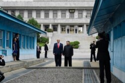 FILE - President Donald Trump meets with North Korea leader Kim Jong Un at the border village of Panmunjom in the Demilitarized Zone, South Korea. It was their third meeting.