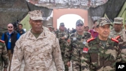 FILE—Gen. Michael Langley, USMC, Commander, U.S. Africa Command, center, and Major General Mohammed Berrid, Inspector General of Moroccan Royal Armed Forces, attend the 20th edition of the African Lion military exercise, in Tantan, south of Agadir, Morocco, May 31, 2024. 