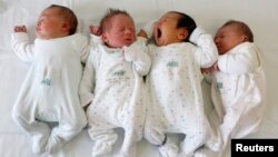 FILE - Babies are pictured in a maternity ward at the Rechts der Isar hospital in Munich.