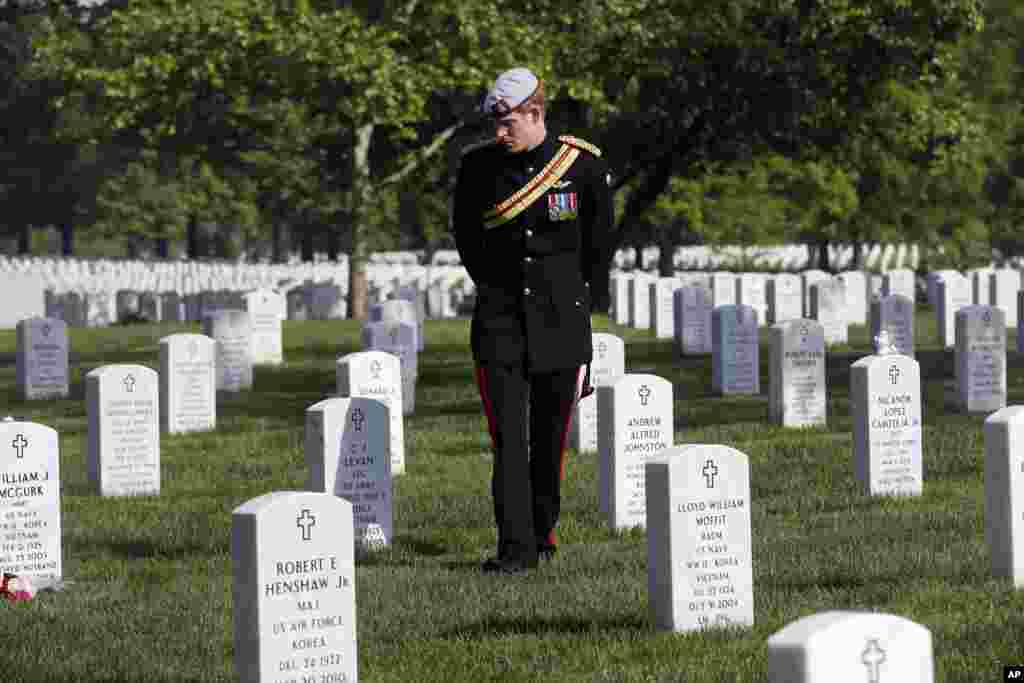 England&#39;s Prince Harry visits Section 60 at Arlington National Cemetery, near Washington D.C.&nbsp; The British soldier-prince is spending most of his week in the U.S. honoring the wounded and the dead of war.