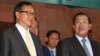 FILE PHOTO - Cambodian Prime Minister Hun Sen, right, talks with the main Opposition Party leader Sam Rainsy, left, of Cambodia National Rescue Party, after their meeting in Senate headquarters in Phnom Penh, Cambodia, Tuesday, July 22, 2012. 