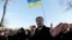 FILE - Ukraine's President Petro Poroshenko speaks with people after a wreath laying ceremony at the monument to the fallen Heroes of the "Heavenly Sotnya (Hundred)," in Kyiv, Ukraine, Nov. 21, 2014.
