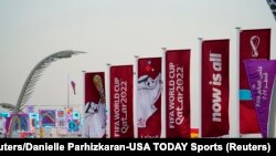 FILE: Nov 16, 2022; Doha, QATAR; La’eeb, the mascot for the FIFA World Cup Qatar 2022, on banners along the Corniche Waterfront. Mandatory Credit: Danielle Parhizkaran-USA TODAY Sports