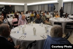 Muslims around the world are observing the holy month Ramadan, which includes fasting from sunrise to sunset. At the Bait-ur-Rehman Mosque in Silver Spring, Maryland, about 200 people gathered for an after-sunset iftar dinner. (Courtesy - Bait-ur-Rehman Mosque)