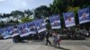 Se exhiben retratos de presos políticos durante una manifestación de ciudadanos nicaragüenses exiliados en Guatemala contra las elecciones generales celebradas en Nicaragua y el gobierno del presidente Daniel Ortega, en Ciudad de Guatemala, el 7 de noviembre de 2021.