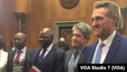 U.S. Senators Jeff Flake, Zimbabwe Politicians Nelson Chamisa and Tendai Biti, Author Peter Godwin