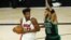 Jimmy Butler (22) du Miami Heat face à Jayson Tatum des Boston Celtics lors d'un match de NBA, USA, le 15 septembre 2020.