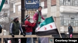 A scene from "Return To Homs" (Courtesy Proaction Film-Directed by Talal Derki-Syria and Germany)