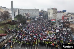 A drone view shows demonstrators staging a protest against government policies, corruption and negligence, which they blame for the deaths of the victims in the November 2024 Novi Sad railway station disaster, in Belgrade, Serbia, Jan. 24, 2025.