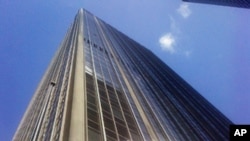 Flag at half mast by New York skyscraper where Japan's consulate is located